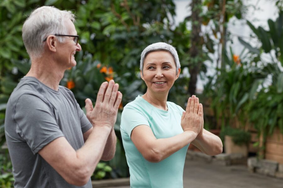 stock photo of mature couple exercising outside